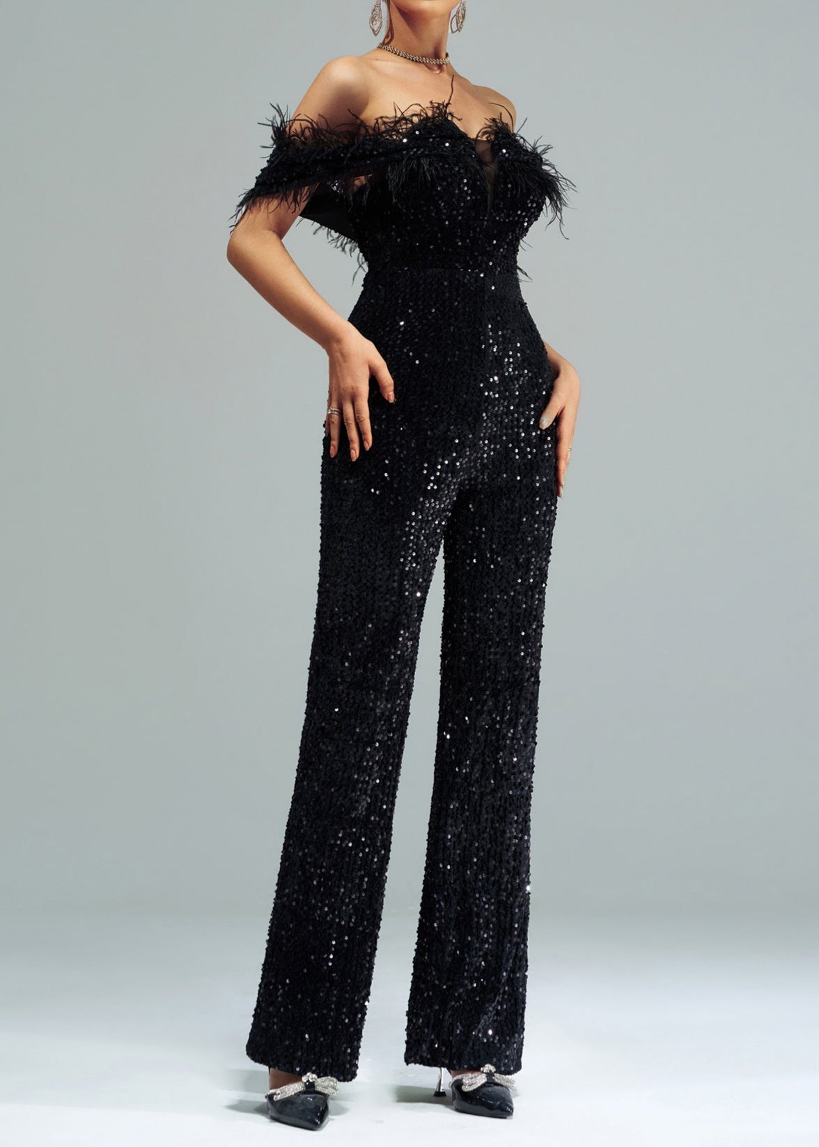 Nodin Off-Shoulder Sequin Jumpsuit In Black