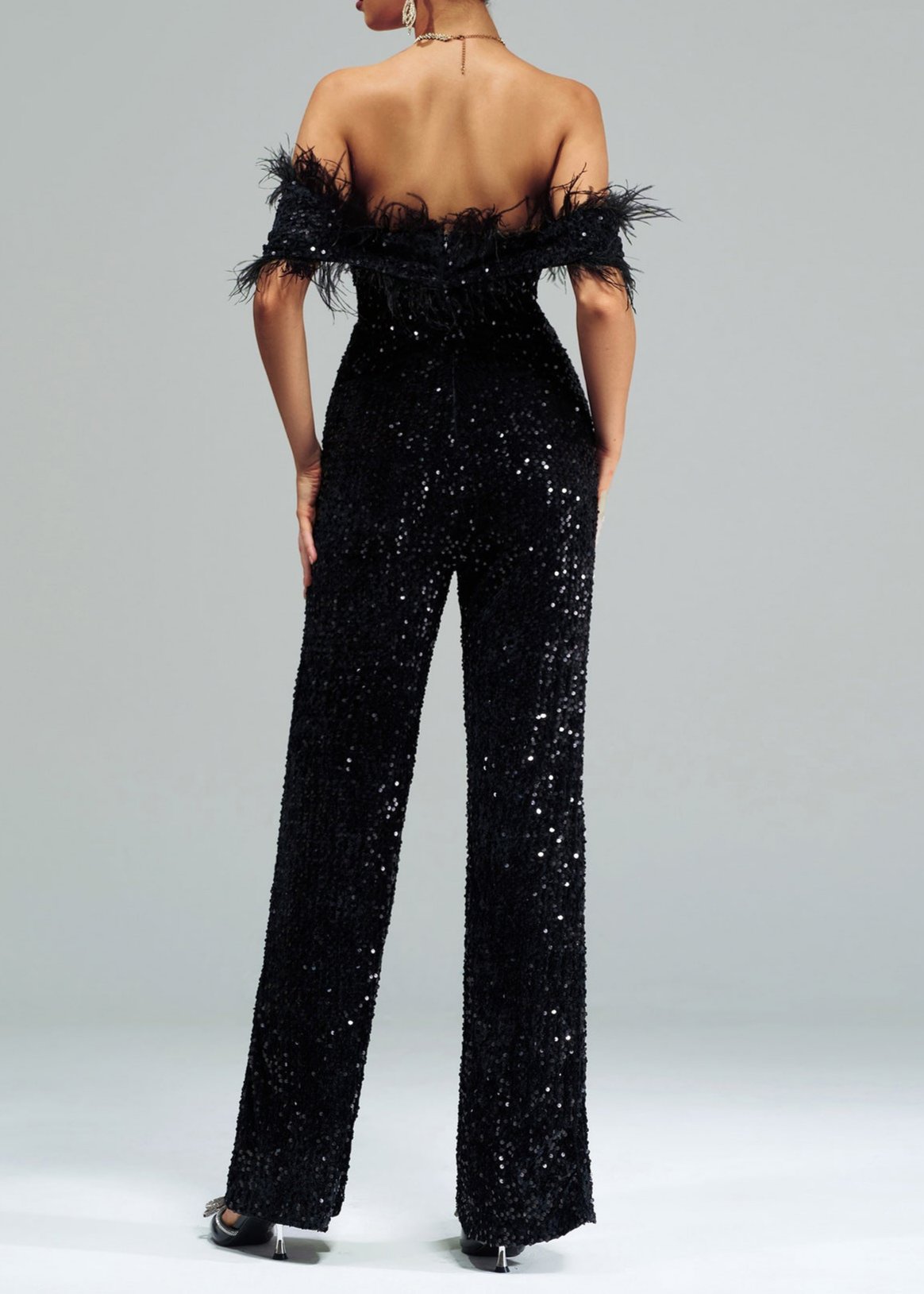 Nodin Off-Shoulder Sequin Jumpsuit In Black